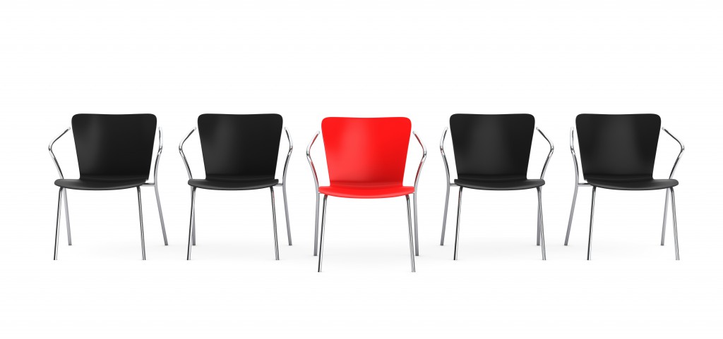Business large meeting. Boss Chair Between other chairs on a white background. 3d rendering